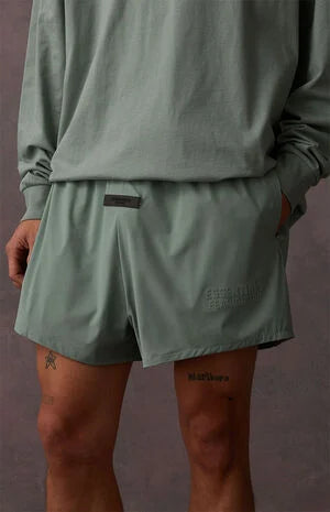 Fear Of God Essentials Nylon Running Shorts - "Sycamore"